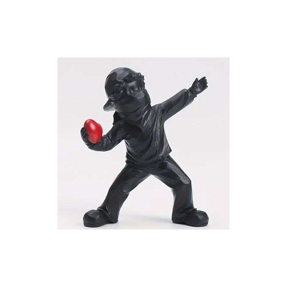 Sculpture moderne lanceur de cœur en résine